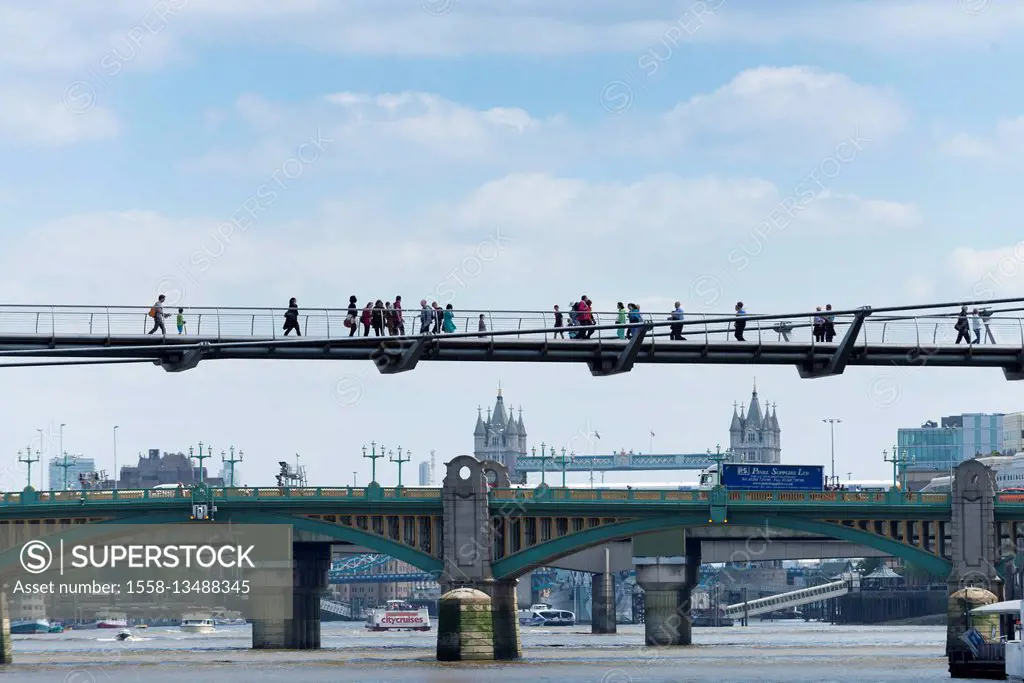 England, London, the Thames, Millennium Bridge, footbridge over the Thames, Southwark Bridge and Tower Bridge in the background