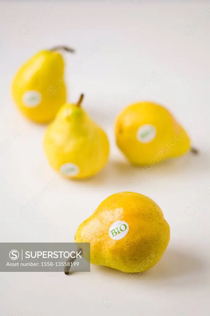 Pears on white table