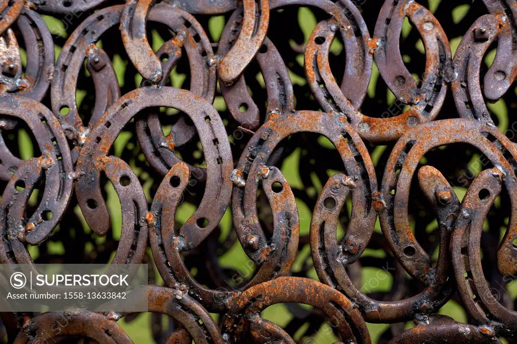 art,collection,equestrian,group,grouped,hipppic,hole,Horseshoe,installation,jaw,obsolete,rural,rust,shadow,solder,weld