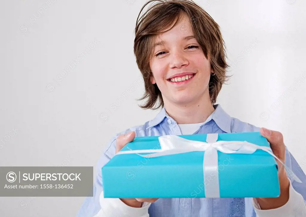 Teenager, boy, cheerfully, gift, smiling, giving, portrait, people, teenagers, happily, cheerfully, with pride, holding, giving, giving, surprise, pac...