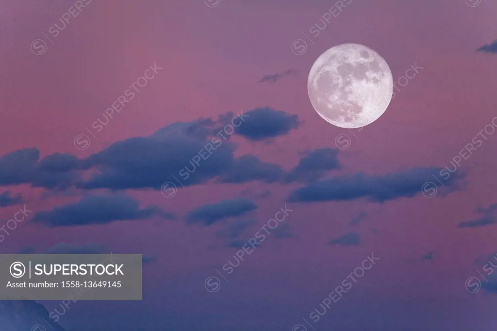 Evening sky with clouds and full moon