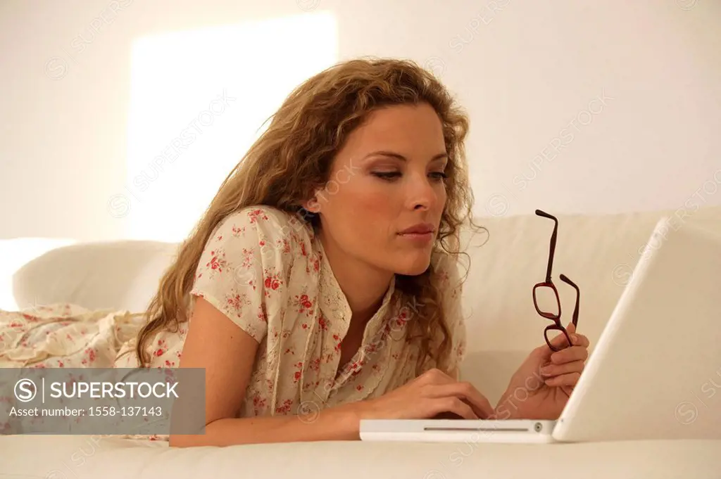Sofa, woman, young, laptop, concentration, detail, series, people, blond, long-haired, curls, lie, comfortable, casual, computers, data input, data-re...