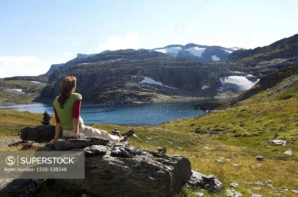 Norway, Fjell, mountain scenery, lake, shore, woman, rock, sitting, relaxation, back view, series, mountains, mountains, snow-fragments, landscape, mo...