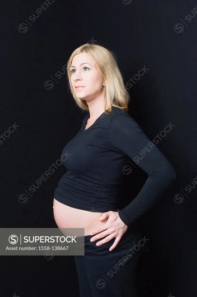 Woman, young, pregnant, happily, presents navel-freely, belly, high-looks, side-opinion, people, blond, pregnant, stands, gesture, self-confidently, w...