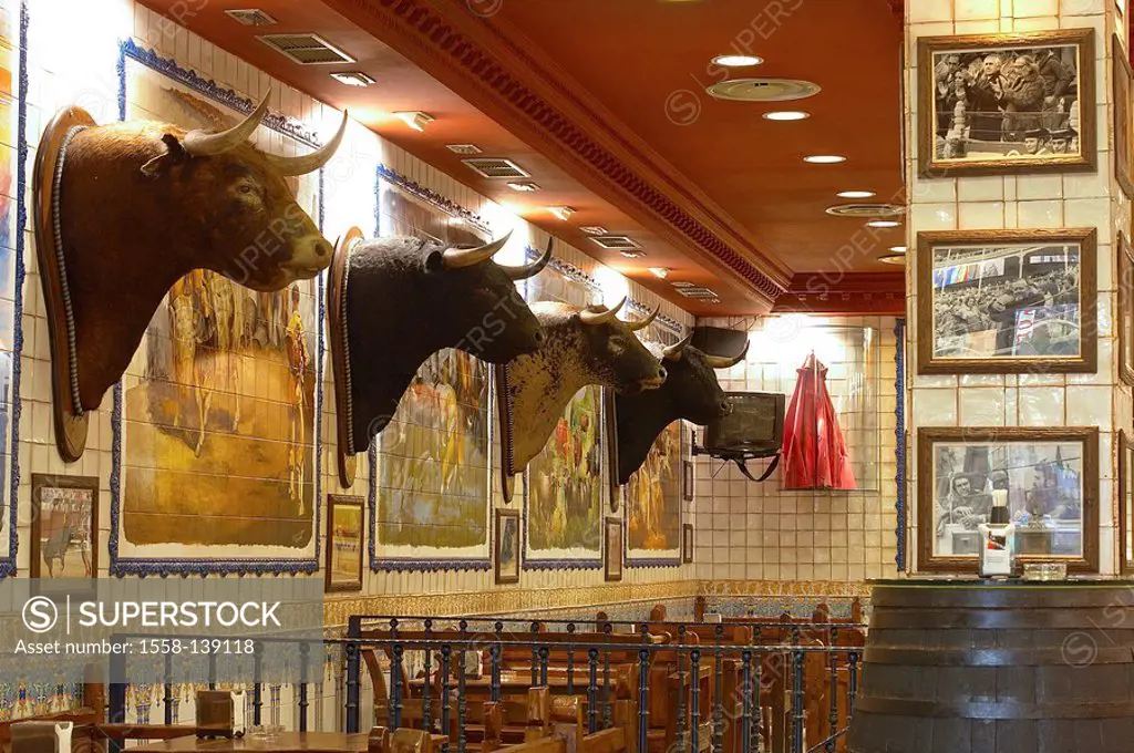 Spain, Madrid, restaurant, indoors, wall, decoration, bull-heads,