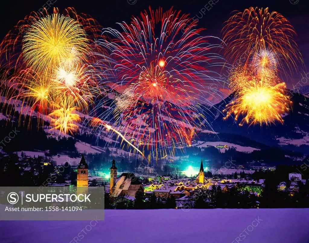 Austria, Tyrol, Kitzbühel, city view, winter, fireworks, M, Alps, mountain scenery, tourist resort, houses, residences, churches, parish-churches, eve...