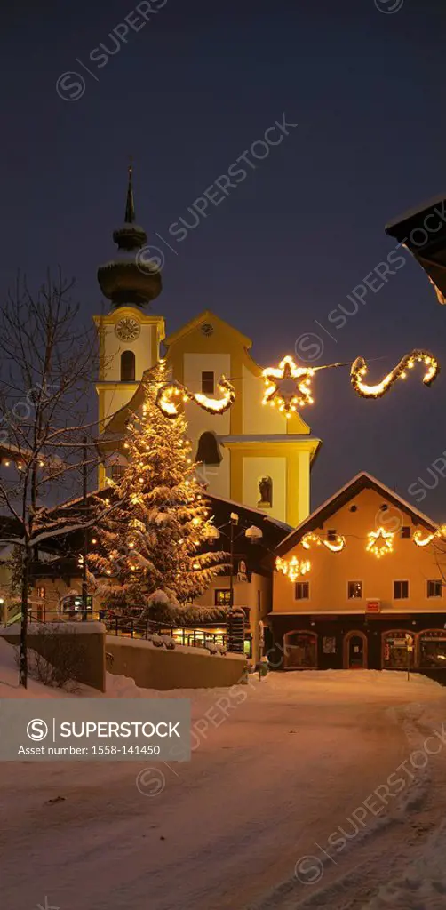 Austria, Tyrol, Unterland, Söll, church, market place, Christmas-tree, evening, houses, residences, parish-church, Christmas, tree, fairy lights, illu...