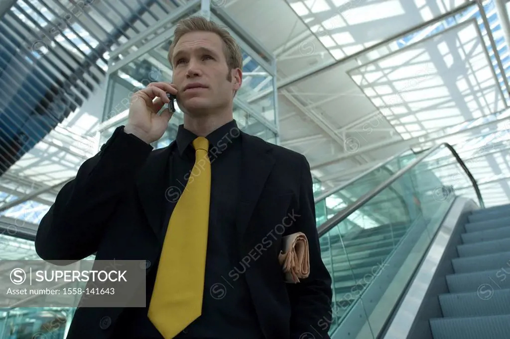 Businessman, escalator, cell phone, telephones,