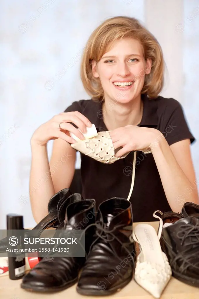 Woman, young, cheerfully, shoes, cleaning, sponge, semi-portrait,