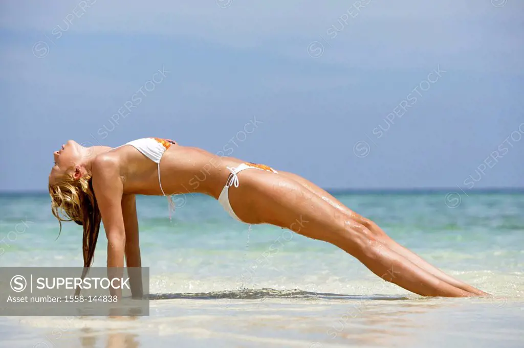 woman, young, blond, bikini, lake,beach, lying,