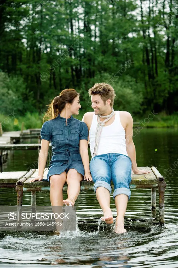 lake,pair, bridge, sitting, feet, water, splash, happy,