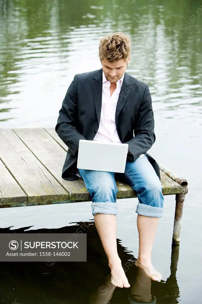 lake,man, bridge, sitting, Notebook, data input,