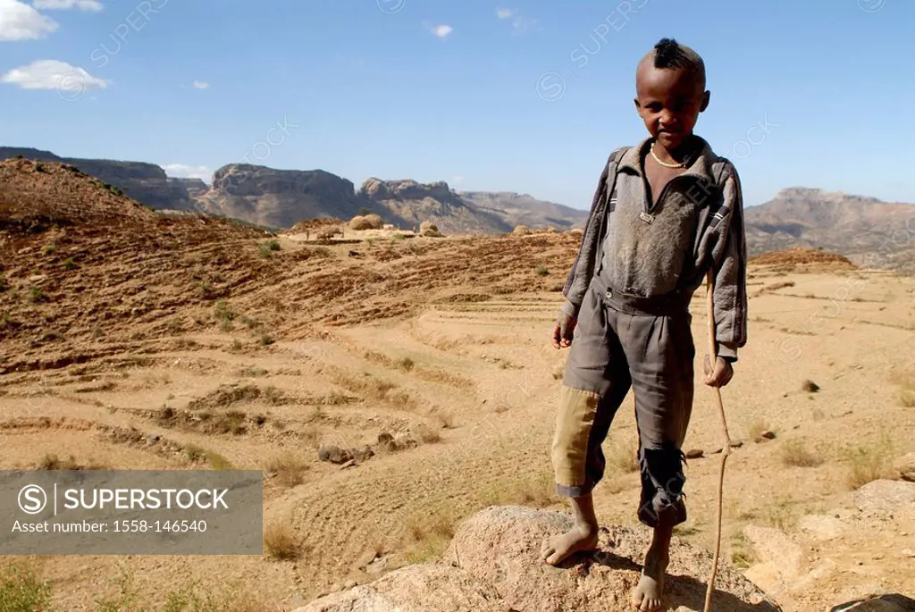Ethiopia, mountain scenery, high_plateau, boy, barefoot, Africa, East_Africa, mountains, rocks, mountain_desert, terrace_fields, terrace_cultivation, ...