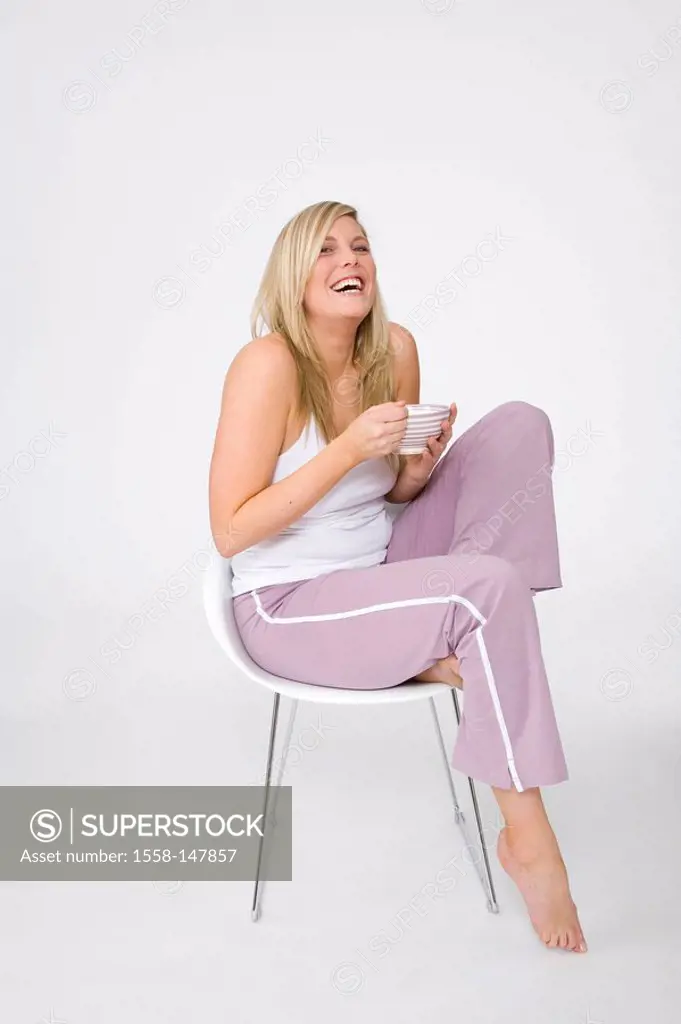 woman, young, cozy, chair, sitting, laughing, muesli, eating, series, people, 30_40 years, blond, long_haired, stout, overweight, jogging pants, leisu...