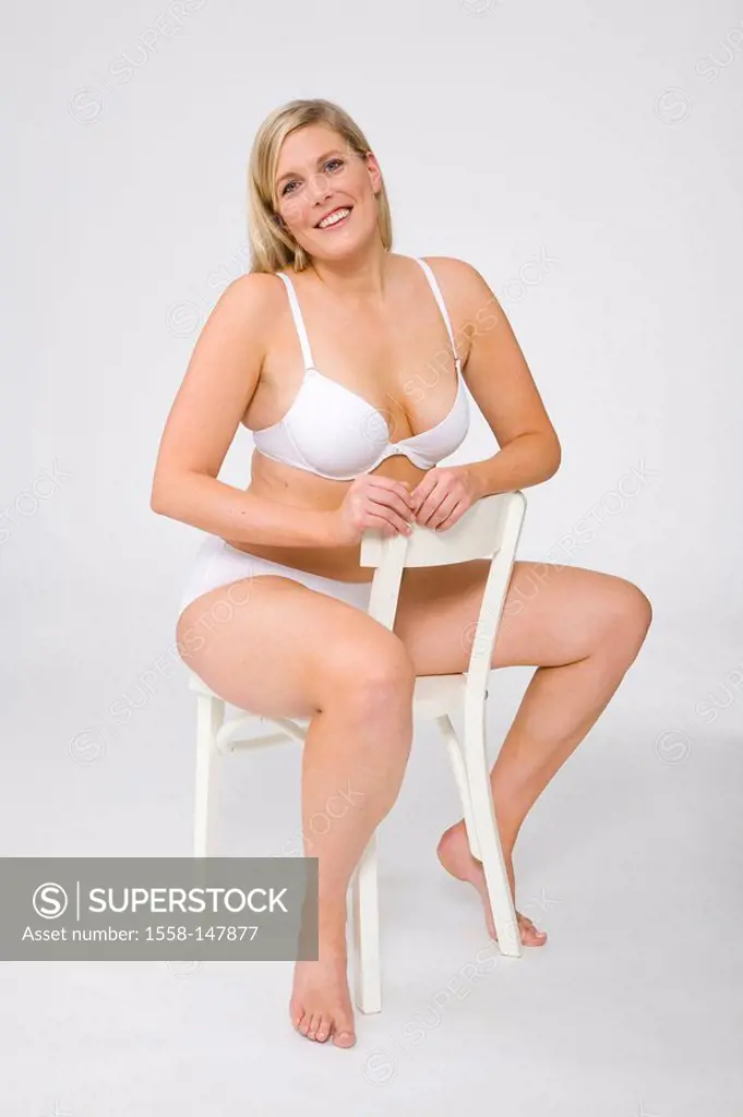 Sits, woman, young, cozy, underwear, chair, series, people, 30_40 years, overweight, stout, quite_body, studio,bra knows, panties, blond, long_haired,...