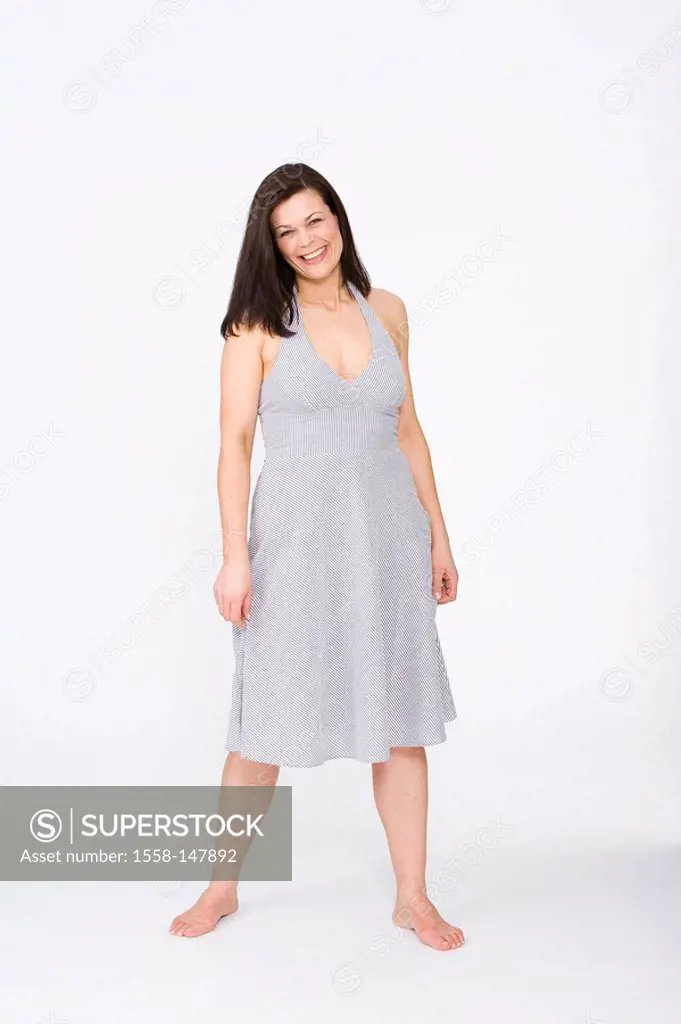 woman, brunette, cozy, dress, stands, people, 30_40 years, long_haired, stout, overweight, barefoot, full_length, summery, summer_dress, studio,smilin...