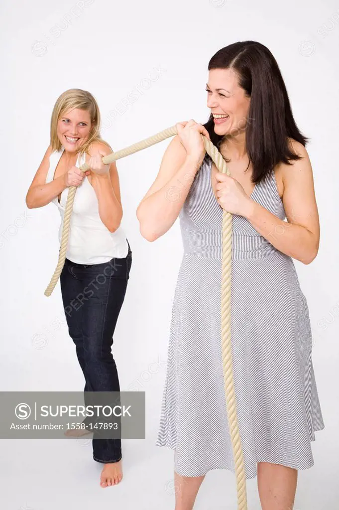 Women, friends, fun, rope_traction, series, people, two, 30_40 years, blond, brunette, long_haired, cozy, stout, overweight, fit, laughing, rope, athl...