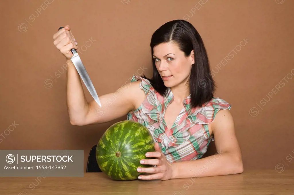 woman, brunette, gesture, knives, melon, portrait, series, people, woman_portrait, 30_40 years, long_haired, cozy, overweight, expression, kitchen_kni...