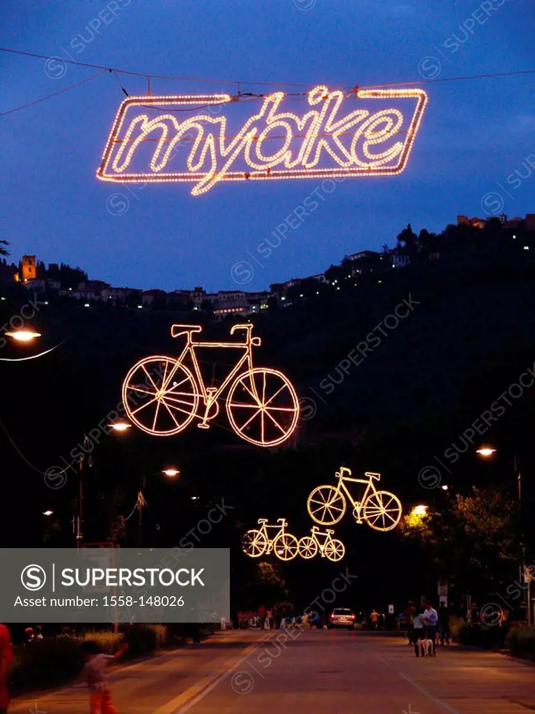 Italy, Tuscany, Montecatini Terme, streets, event, decoration, lights, bicycles, evening, health resort, locality perspective, streets scenery, sporti...