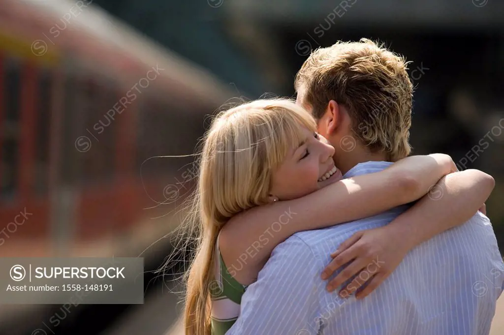 Platform, couple, greedsing, embrace, cheerfully, series, people, love_pair, young, joy, happily, arrives, greedss, welcome, sees again, return, arriv...