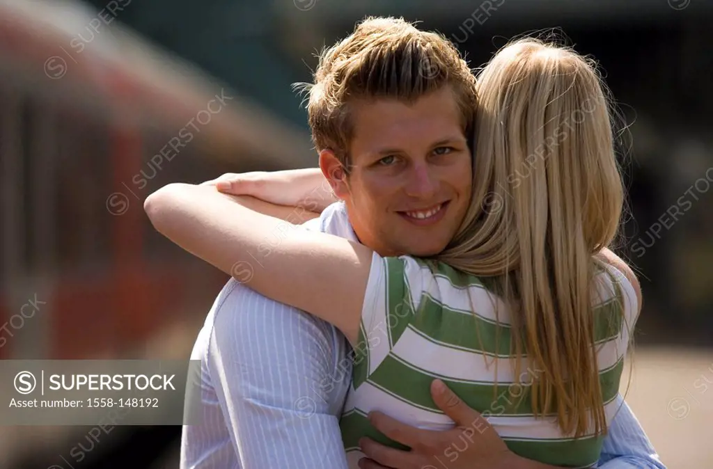 Platform, couple, greedsing, embrace, cheerfully, series, people, love_pair, young, joy, happily, arrives, greedss, welcome, sees again, return, arriv...