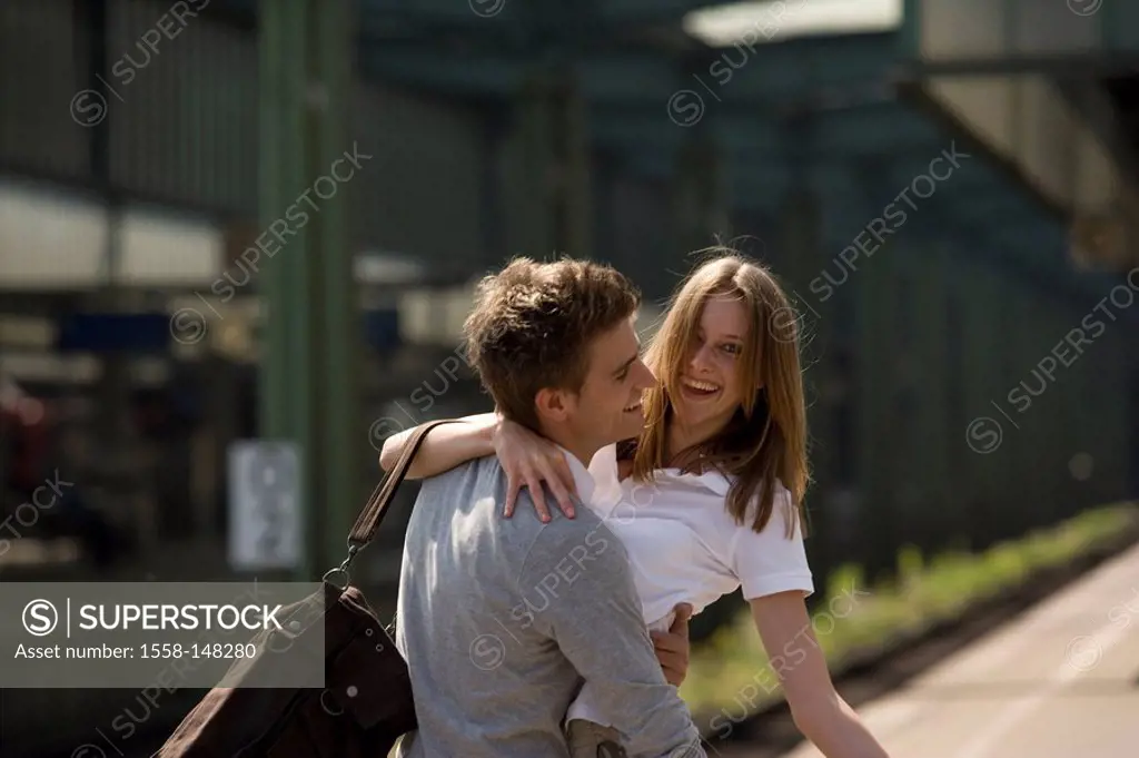Platform, couple, greedsing, embrace, cheerfully, series, people, love_pair, young, joy, happily, arrives, greedss, welcome, sees again, return, arriv...