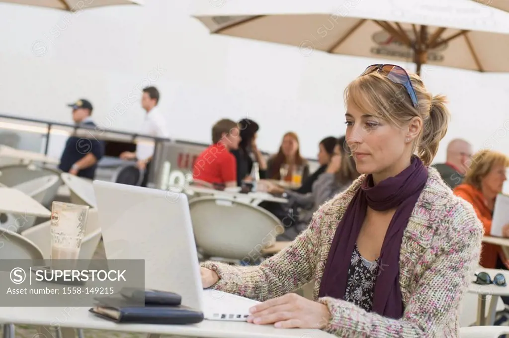 pavement café, woman, young, laptop, data input, at the side, series, people, student, 20_30 years, blond, cardigan, cafe, outside, sitting, computers...