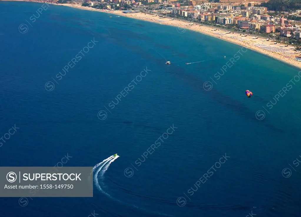 Turkey, coast, beach, lake,boat, Parasailing, aerial_shot, coast_region, city, hotel_buildings, hotels, high_rises, beach, sandy beach, swimmers, tour...