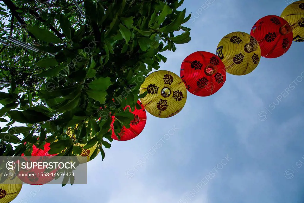 Singapore, Chinatown, street decoration, lampions in yellow and red over the street