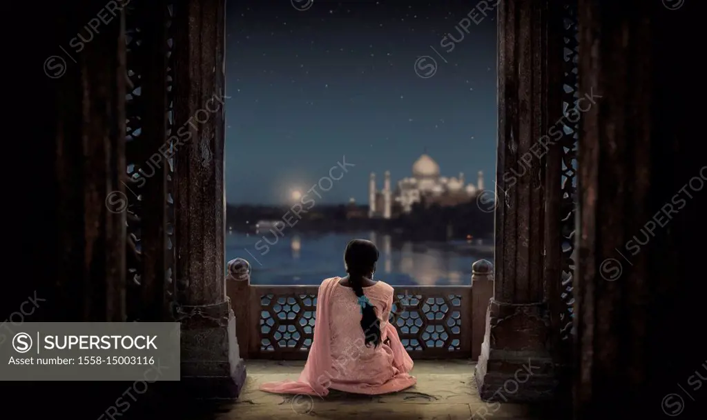 Woman looking at Taj Mahal, Agra, Uttar Pradesh, India, Asia