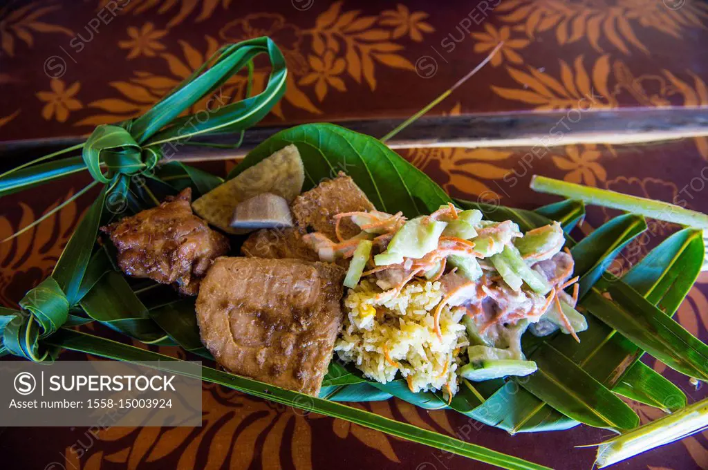 Local food served on a plam leave, Bora Bora, French Polynesia