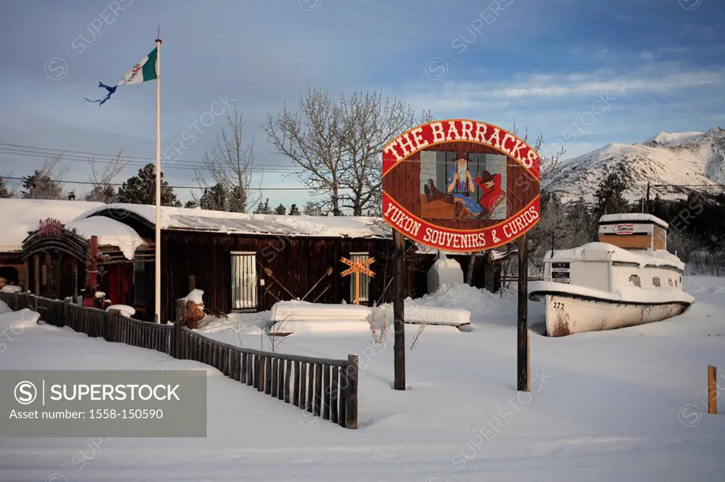 Canada, Alaska, Yukon Territory, Carcross, souvenir_business, winter, North America, mountains, village, houses, sign, sale, souvenirs, garden, boat, ...