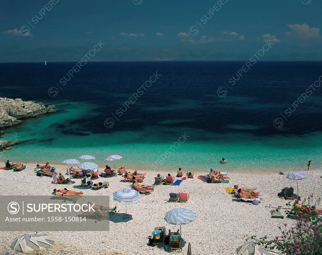 Greece, island Corfu, Kassiopi beach_scene swimmers lake,coast, bay, beach, beach, gravel beach, people, tourists, vacationers, parasols, deck chairs,...