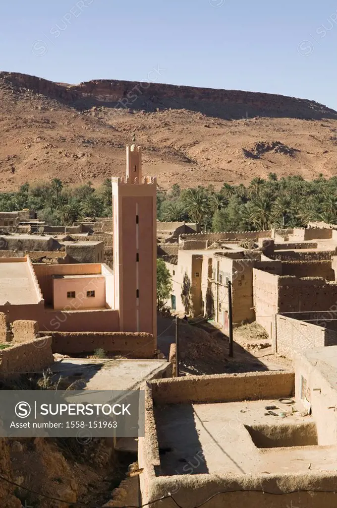 Morocco, Ziz_Valley, Aoufouss, city view, mosque, date_palms, Africa, North_Africa, landscape, rocky, stony, houses, clay_construction_manner, archite...