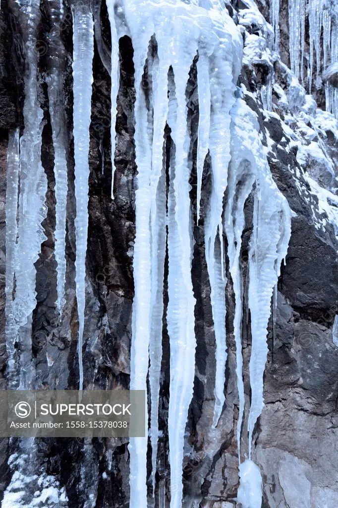 Icicles on a steep rock face
