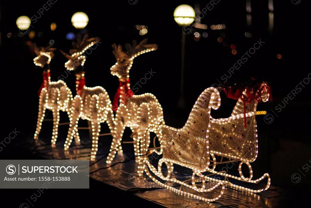Reindeer sleighs, light hoses, night,