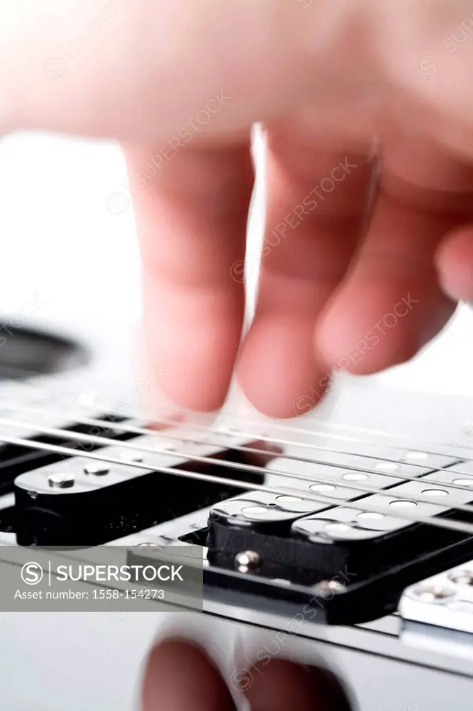 electric guitar, strings, cartridges, male hand, close_up,