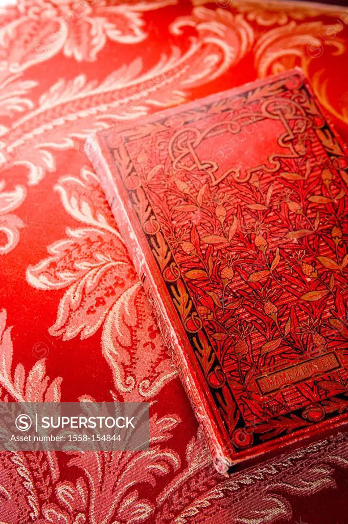 Book, old, brocade material, closed, red, close_up,