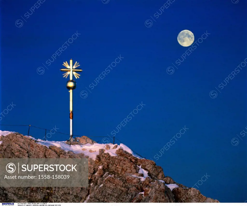 Germany, Zugspitze, Cross on the summit of a mountain, Full moon