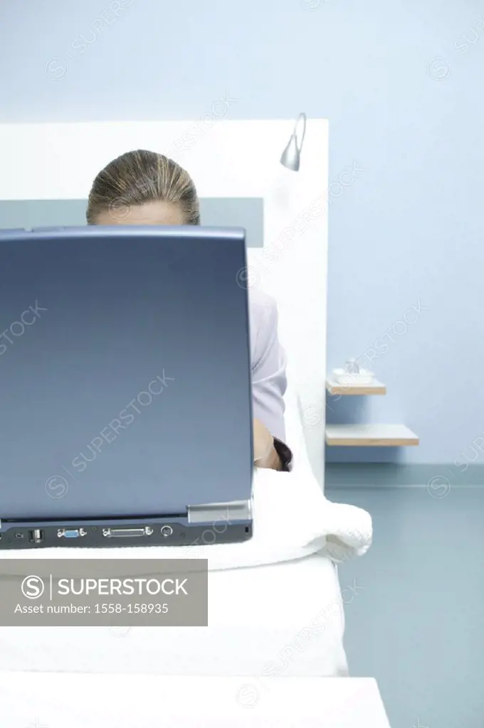 Hotel room, businesswoman, bed