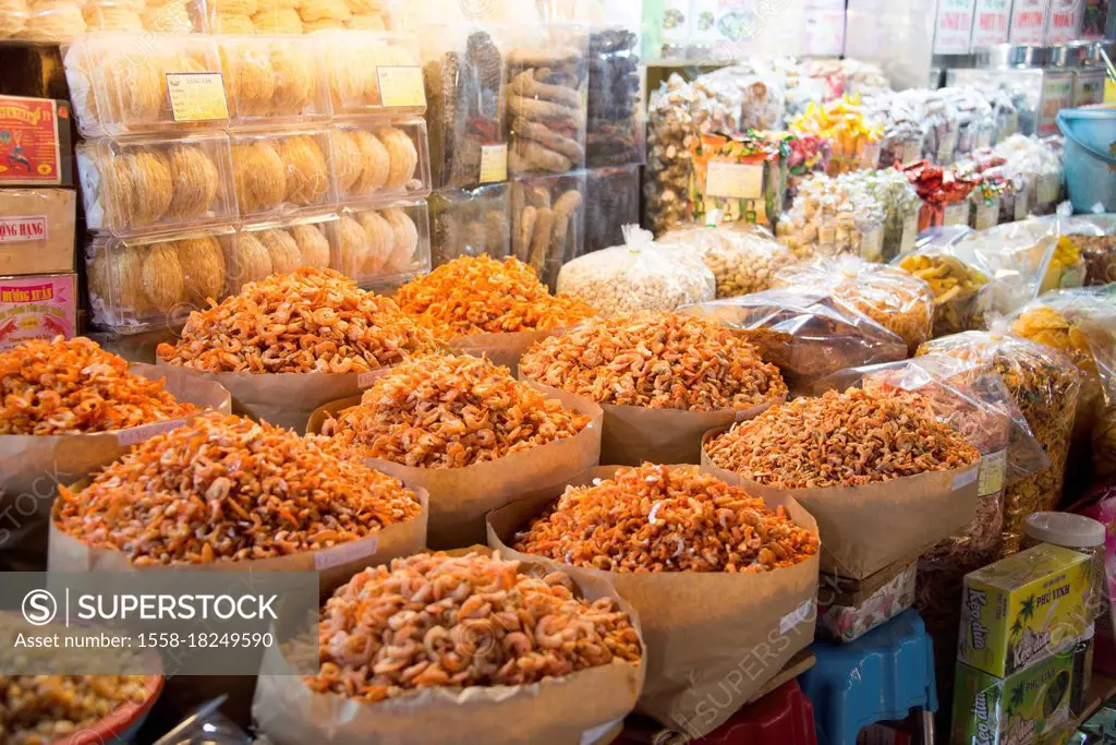 Dried crabs in baskets, indoor market in Ho Chi Minh City, Vietnam