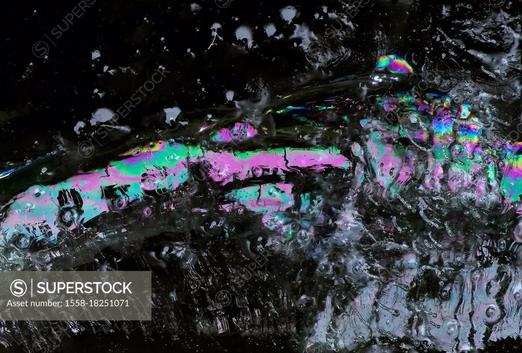 Close-up, structure on ice, shimmering spectrum
