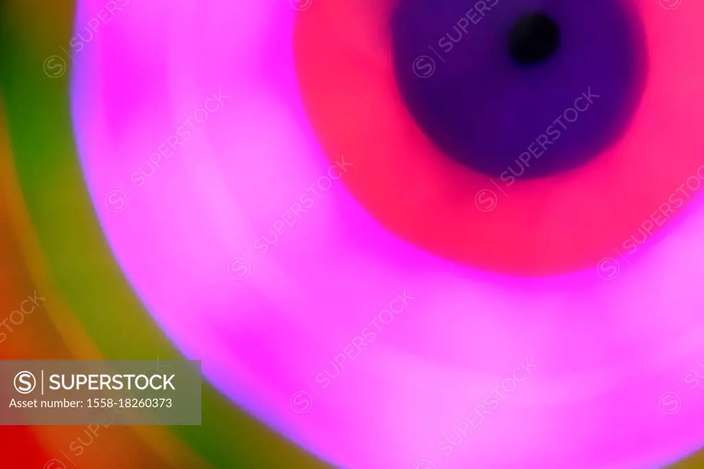Psychedelic circles in red, pink and green