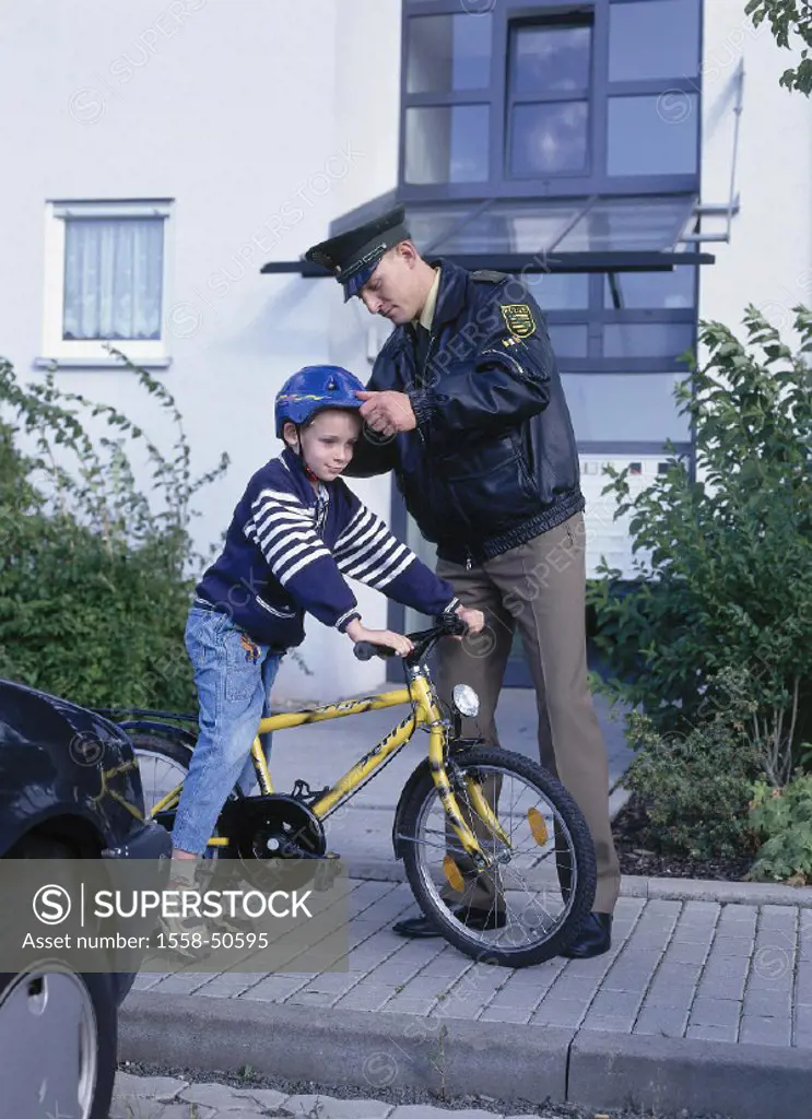 Traffic education, boy, bicycle, police officer, protection helmet, tests, city, roadside, footpath, man, occupation, police, official, police officia...