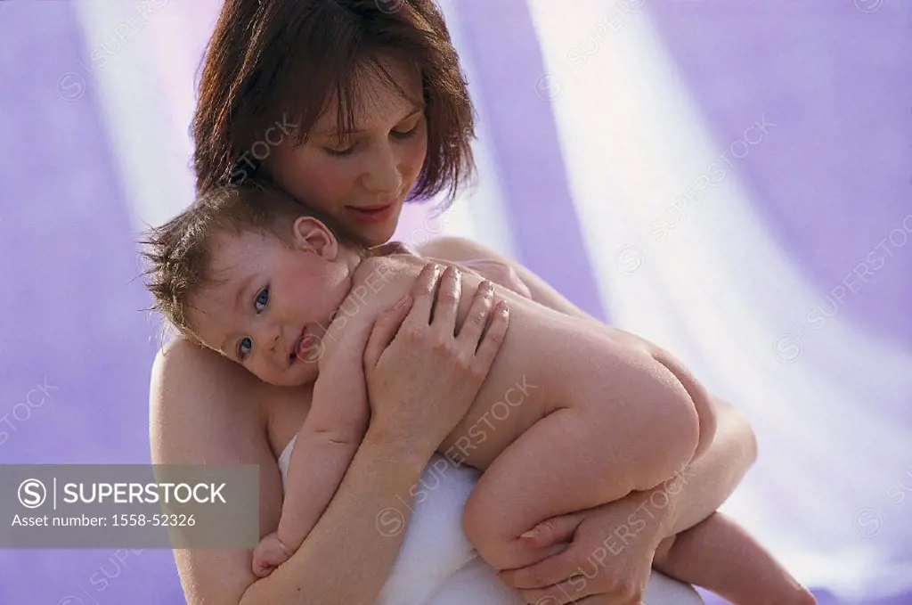Mother, baby, bare, holds, indoors, at home, woman, young, lovingly, child, toddler, infant, trust, love, guards tenderly, tenderness, welfare, carefu...