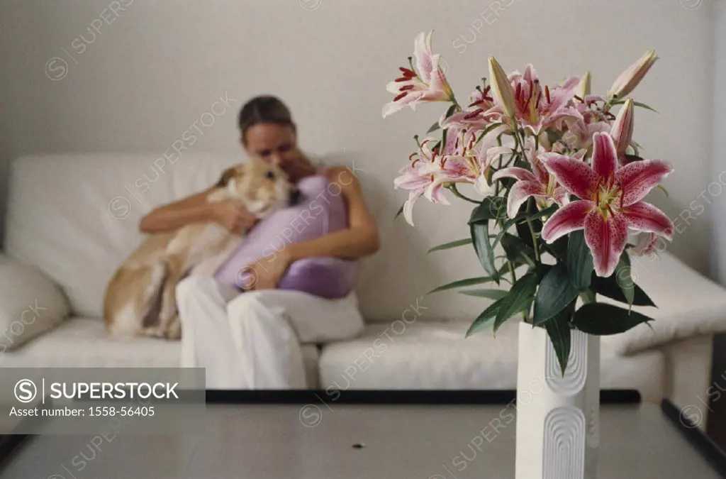 Living space, sofa, woman, dog,