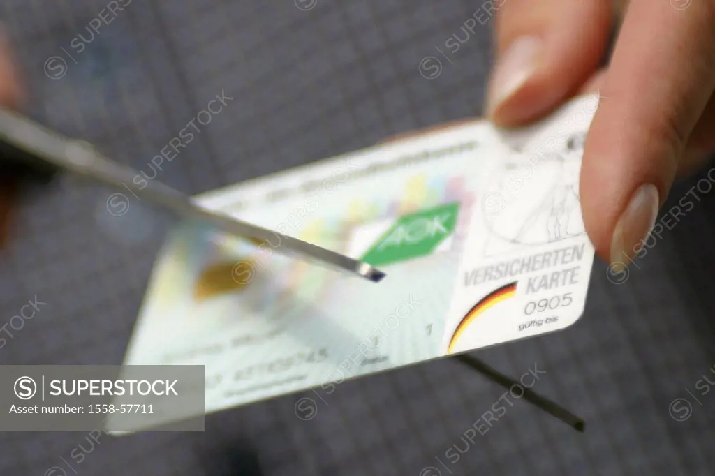 Scissors, health insurance card