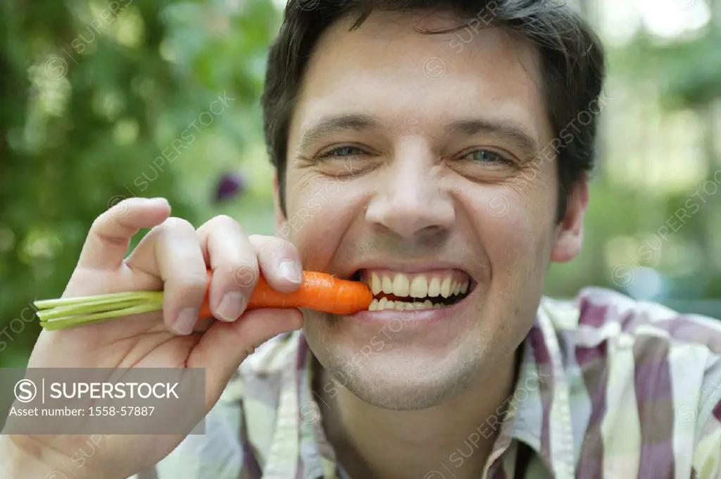 Man, bites off, cheerfully, carrot