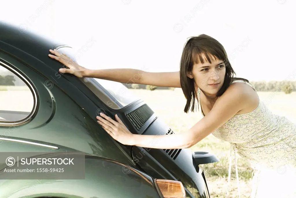 Woman, young, breakdown, car, pushes,  Look shoulder, half portrait, at the side  Series, country road, women portrait, 20-30 years, dark-haired, long...