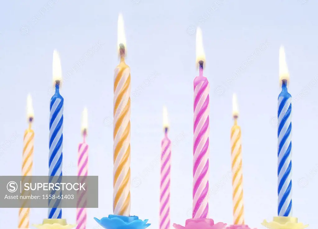 Birthday candles, colorfully, burning    Candlesticks, candles, wax candles, in two colors, pink-know, blue-white, yellow-white, lights, candlelight, ...